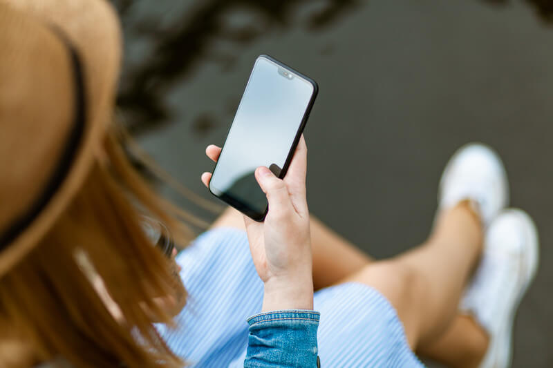 woman holding a smartphone