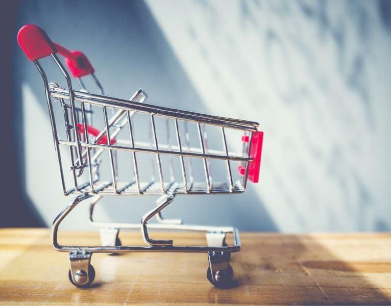 side view of Shopping cart on table